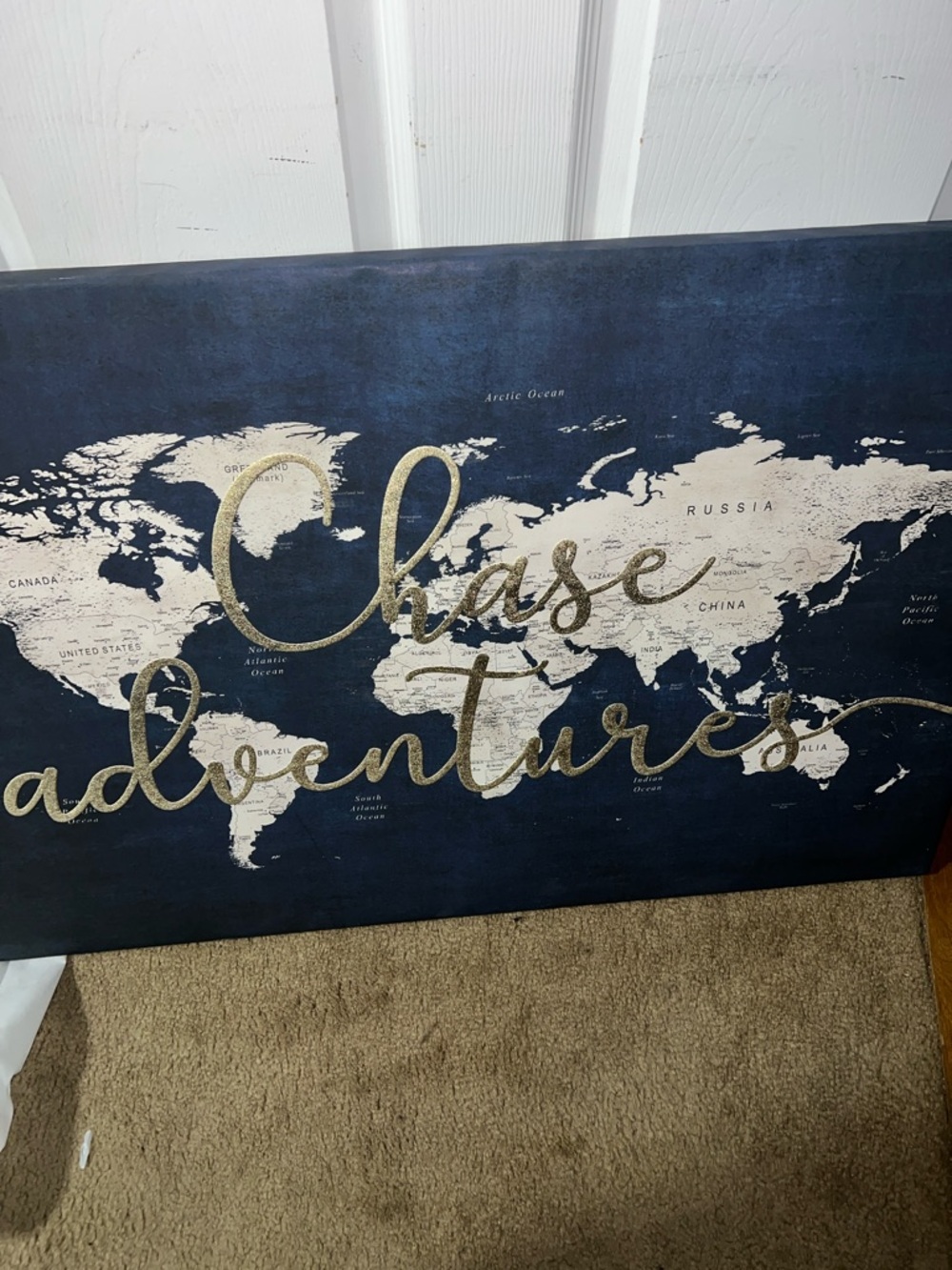 Chase Adventures World Map Canvas Wall Art in Navy and Cream with Gold Script